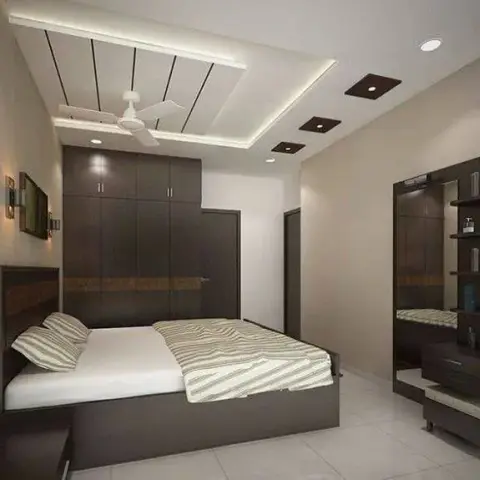 Render of a compact bedroom where a wenge wardrobe wall with a burl-laminate band runs behind a storage bed