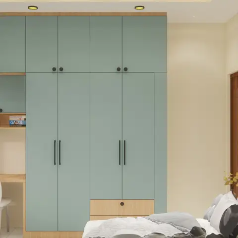 Render of a compact bedroom with a sage-green wardrobe wall trimmed in light wood, a built-in study nook with open shelving