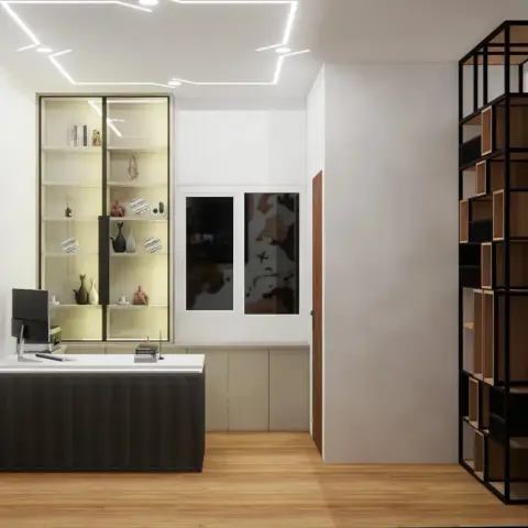 Render of a compact study with a fluted charcoal desk block, a backlit white display niche and a freestanding black-metal grid shelf screening the doorway.
