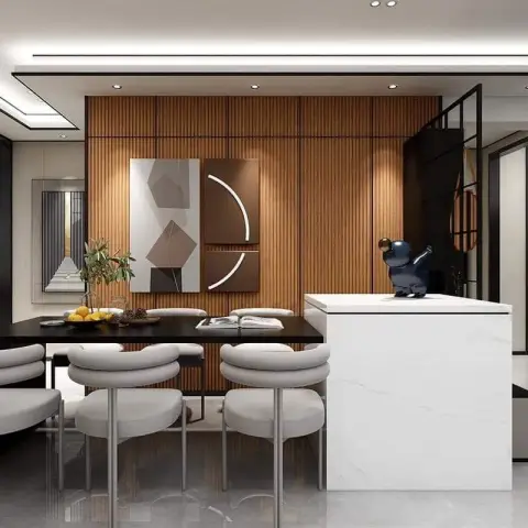 Render of a dining zone: black stone-top table with cream boucle chairs against a full-height fluted wood wall, beside a white marble waterfall island.