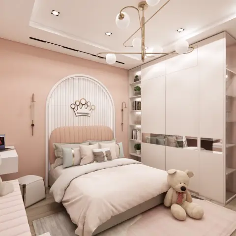 Render of a girl's bedroom in blush and cream — a pink velvet fluted headboard set into an arched white alcove under a gold crown motif