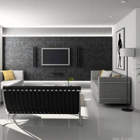 Render of a grey-and-white living room where a charcoal damask feature wall carries a wall-hung TV between two slim black speakers