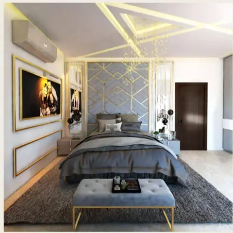 Render of a grey bedroom where gold criss-cross bands run across the cove-lit ceiling