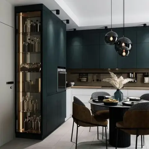Render of a handleless forest-green kitchen with a walnut backsplash rail, a floor-to-ceiling backlit bottle-and-glassware column at the entry