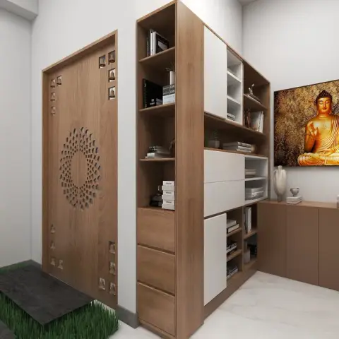 Render of a home entrance with a carved wooden jaali-pattern main door, an open wood-and-white display shelf, and a golden Buddha wall art above a console.