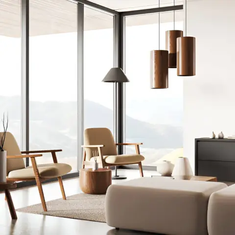 Render of a living lounge with floor-to-ceiling glazing overlooking mountains, cream mid-century armchairs, a cluster of wood cylinder pendant lights