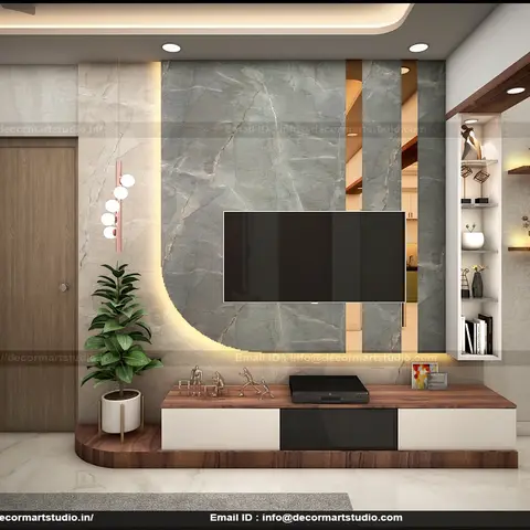 Render of a living room TV wall clad in grey marble with vertical brass inlay strips, a floating walnut-and-white TV console