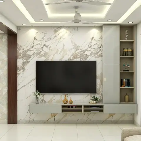 Render of a living-room TV wall clad in gold-veined white marble, with a sage-grey handleless console running under the screen into a tall unit of open oak