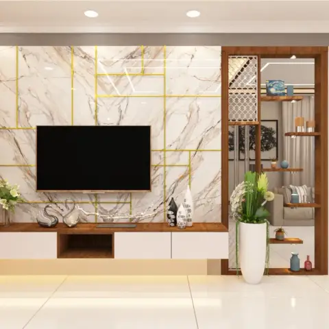 Render of a living-room TV wall in veined white marble scored with a brass inlay grid, with a walnut-and-white floating console over a lit skirting