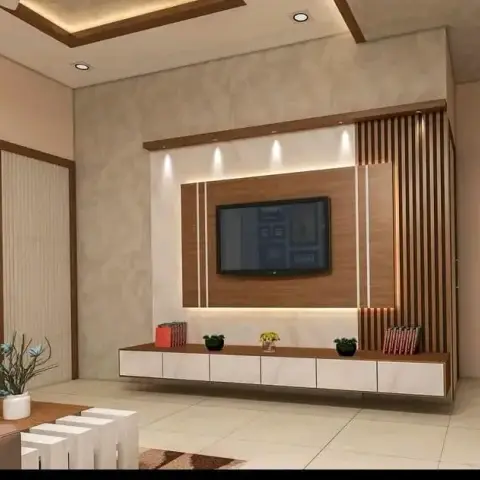 Render of a living room TV wall with a floating wood-and-white TV unit, marble panelling, a fluted wood accent strip and a cove-lit stepped POP ceiling.