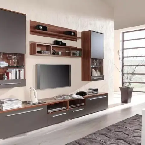 Render of a living room wall system in walnut and grey gloss - two lit glass display cabinets hung either side of the TV