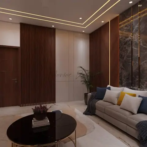 Render of a living room where a dark grey marble slab wall with vertical brass reveals meets walnut fluted panelling