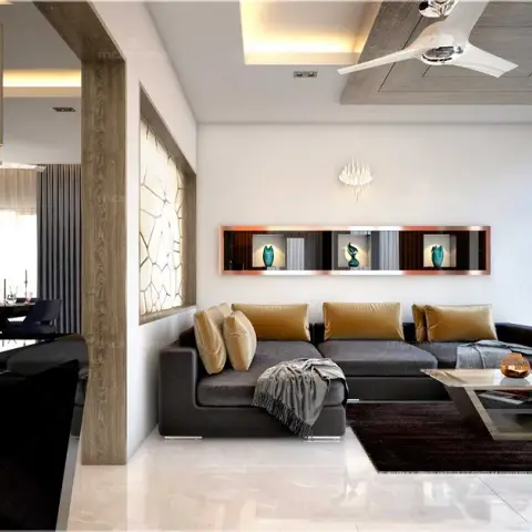 Render of a living room where a dark brown L-sofa with mustard cushions sits below a slim orange-lined display niche box