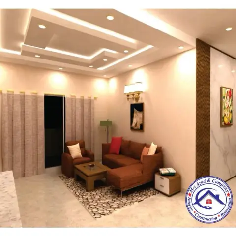 Render of a living room with a brown fabric L-sofa and armchair on a pebble-print rug, a layered POP ceiling with cove lighting