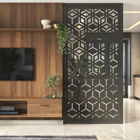 Render of a living room with a walnut-panelled TV wall and console, beside a black laser-cut jaali partition screen dividing into a light-wood kitchen