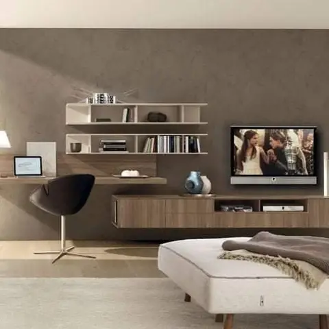 Render of a living room with a floating wood TV wall unit combining open shelving with a built-in study desk, and a cushioned ottoman bench.