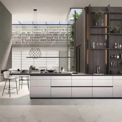 Render of a long handleless island kitchen in pale grey with a black stone top, backed by a full-height smoked-oak open shelving wall lit by vertical LED