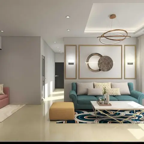 Render of a long living room with a teal buttoned sofa against gold-trim wall frames holding a circular mirror-and-marble art piece
