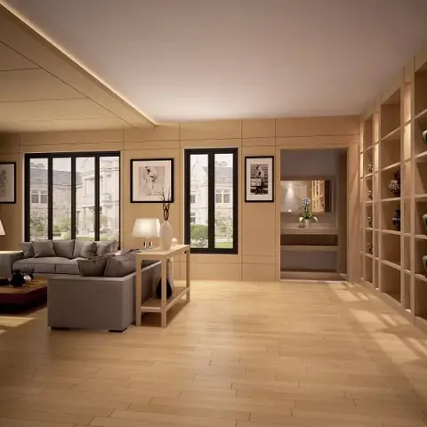 Render of a long maple-lined living room where a floor-to-ceiling grid of niches holding dark ceramic vases faces two grey sofas and a low red-brown plinth