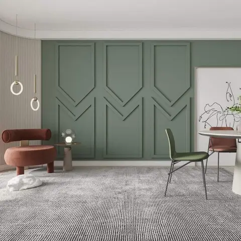 Render of a lounge corner against a sage-green wall of chevron-tipped moulding panels, with a rust tub chair on stubby legs
