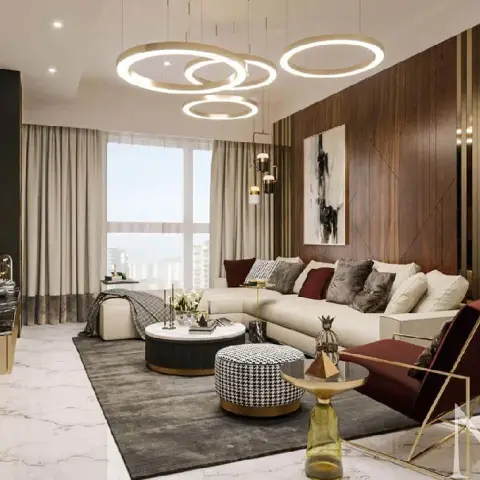 Render of a luxury living room with fluted walnut wall panelling, layered gold ring pendant lighting