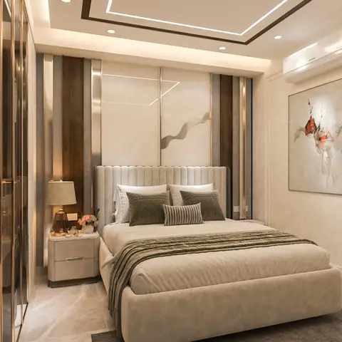 Render of a narrow beige bedroom: a fluted cream upholstered headboard wall banded with walnut and mirror strips faces a moulded wall carrying one abstract