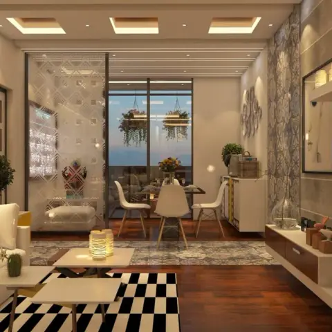 Render of a narrow living-dining running out to a balcony: cream sofa on a black-and-white chevron rug facing a grey stone-clad TV wall with floating shelves