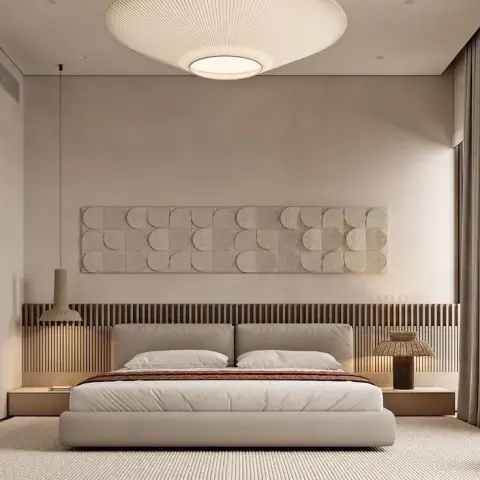 Render of a pared-back bedroom under a large pleated disc ceiling light, with an oak slat band running wall-to-wall behind the low bed and a beige