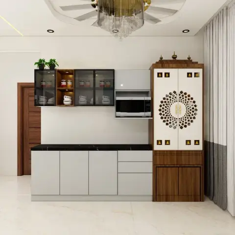 Render of a pooja unit with a carved sunburst-jaali shutter pair, gilded kalash finials on the pelmet and small brass deity motifs down the stiles