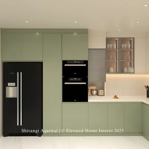 Render of a sage-green handleless L-kitchen with a black side-by-side fridge boxed into the tall run, stacked oven and combi microwave