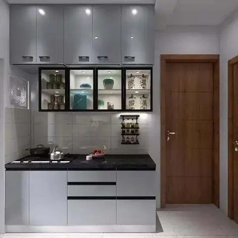 Render of a short single-wall grey modular kitchen where a black-framed backlit display box holding teal ceramic jars sits between the wall cabinets and the