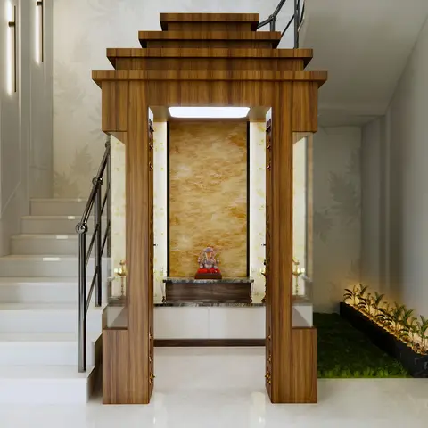 Render of a temple-style teak pooja unit with a backlit onyx panel, set beneath a staircase beside an indoor landscaped planter strip.