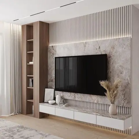 Render of a TV wall with fluted wood panelling, a marble slab backdrop, an open wood shelving column, and a floating white console styled with books