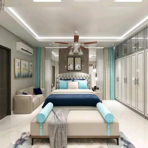 Render of a wide bedroom with an ivory tufted wing headboard, layered aqua-and-cream curtains and a bolster-ended bench at the foot of the bed