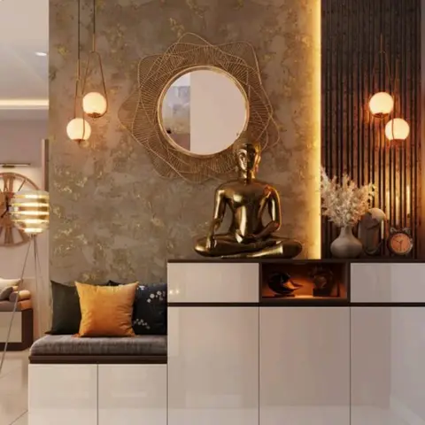 Render of an entrance foyer with a white gloss shoe cabinet, a starburst mirror over a gold Buddha statue