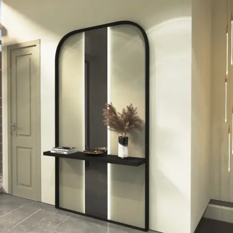 Render of an entrance foyer with an arched black-framed mirror over a floating console table, pampas grass in a vase