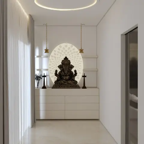 Render of an entrance foyer with a backlit jaali-pattern medallion behind a Ganesha idol on a floating console, flanked by hanging brass diyas.