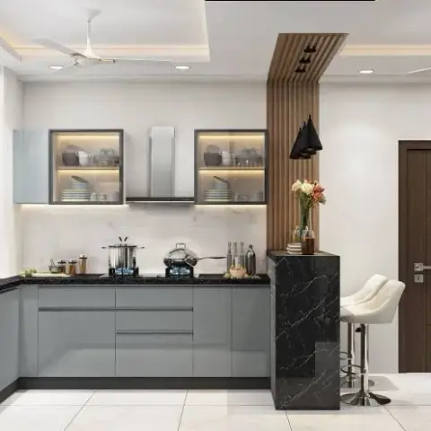 Render of an L-shaped grey-gloss kitchen with black-marble counter running into a slab-clad breakfast pillar