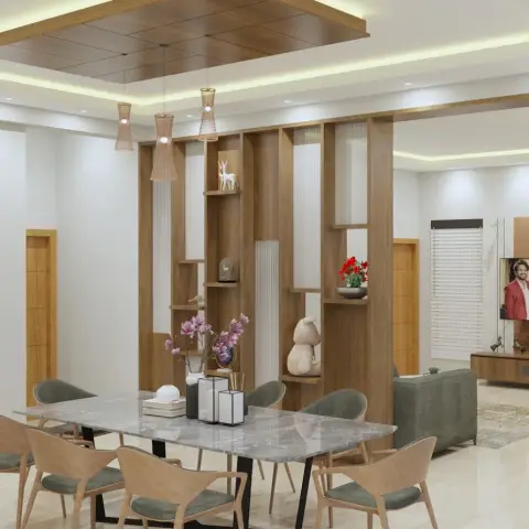Render of an open dining and living space divided by a fluted wood display partition, with a marble dining table, woven rattan pendant lights