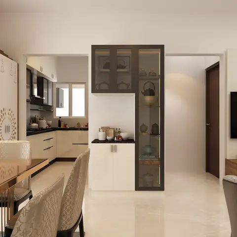 Render of an open-plan home showing a wood dining table with patterned chairs, a glass-front crockery display unit, a light beige modular kitchen beyond