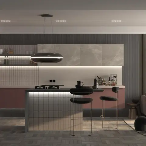 Render of an open-plan kitchen and living space with dusty-pink fluted cabinetry, a marble-clad island under a statement oval pendant light