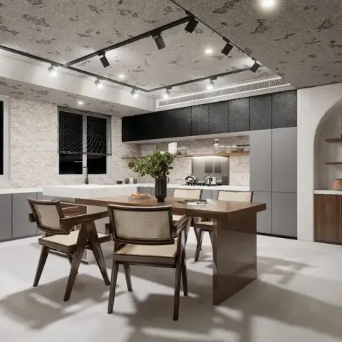 Render of an open-plan kitchen-dining space with a walnut cane-back dining set, matte grey and black kitchen cabinetry