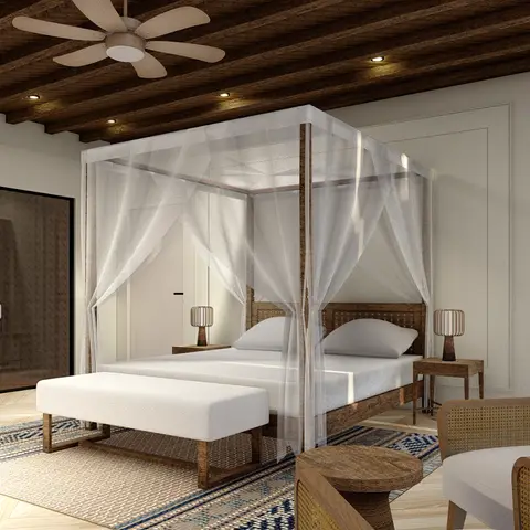 Rendered boho bedroom with a sheer-draped four-poster rattan bed, exposed wood-beam ceiling, cane armchairs and a layered block-print rug