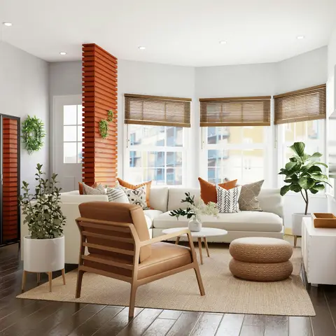 Rendered boho living room with a terracotta fluted-slat column, a white sectional sofa with orange cushions, a tan leather armchair, and a jute rug.