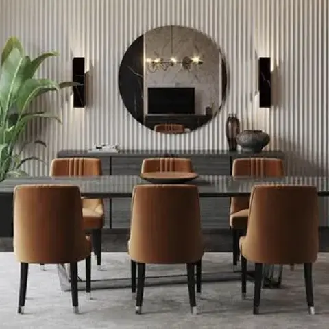 Rendered dining room with a dark stone table and tan leather chairs set against a fluted wood panel wall, a round mirror flanked by wall sconces above a console