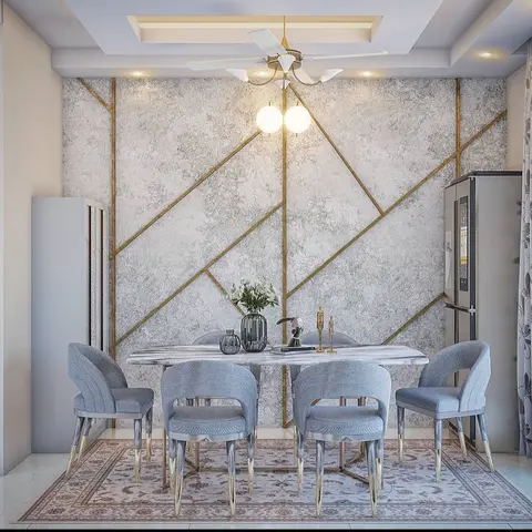 Rendered dining room with a grey marble-effect wall crossed by gold inlay lines, a marble-top table with grey velvet gold-legged chairs