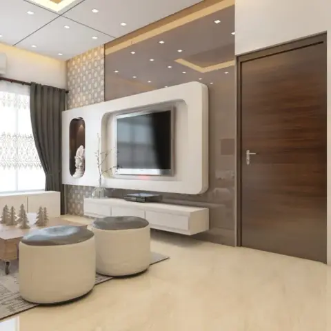 Rendered living room where a rounded white TV panel carries a side niche holding a white Ganesh idol