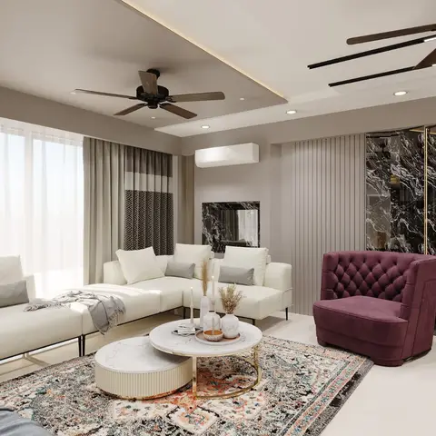 Rendered living room with an ivory L-shaped sofa, a maroon tufted velvet armchair, a round marble-and-brass coffee table on a Persian-style rug