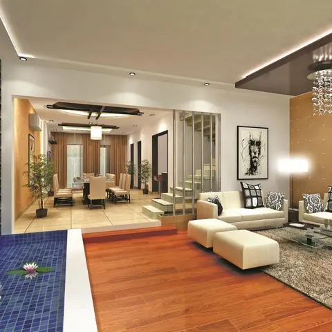 Rendered open-plan home showing a living room with cream sectional sofas and framed art, a dining area beyond glass partitions, a staircase