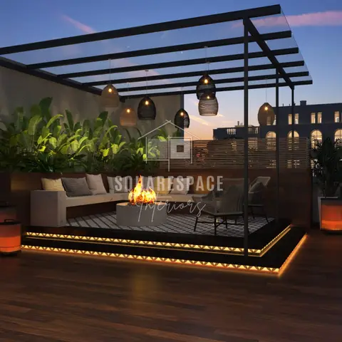 Rooftop terrace lounge under a glass-topped black pergola with woven pendant lanterns, an L-shaped built-in bench around a concrete fire pit, rattan armchairs